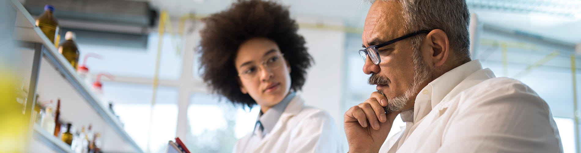 Enterprise Genomics Solutions, two scientist in discussion